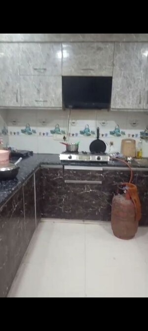Kitchen in 2 BHK Apartment at Ansal Palam Triangle, Palam Vihar Extension – for Rent