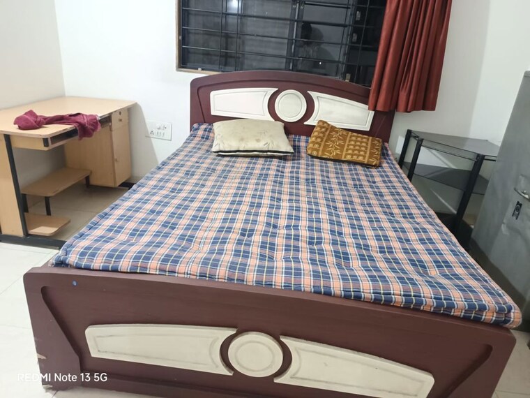 Bedroom, magarpatta-city-cosmos 2 Bedroom 1000 Sq.Ft. Apartment In Magarpatta Road Pune 10302016