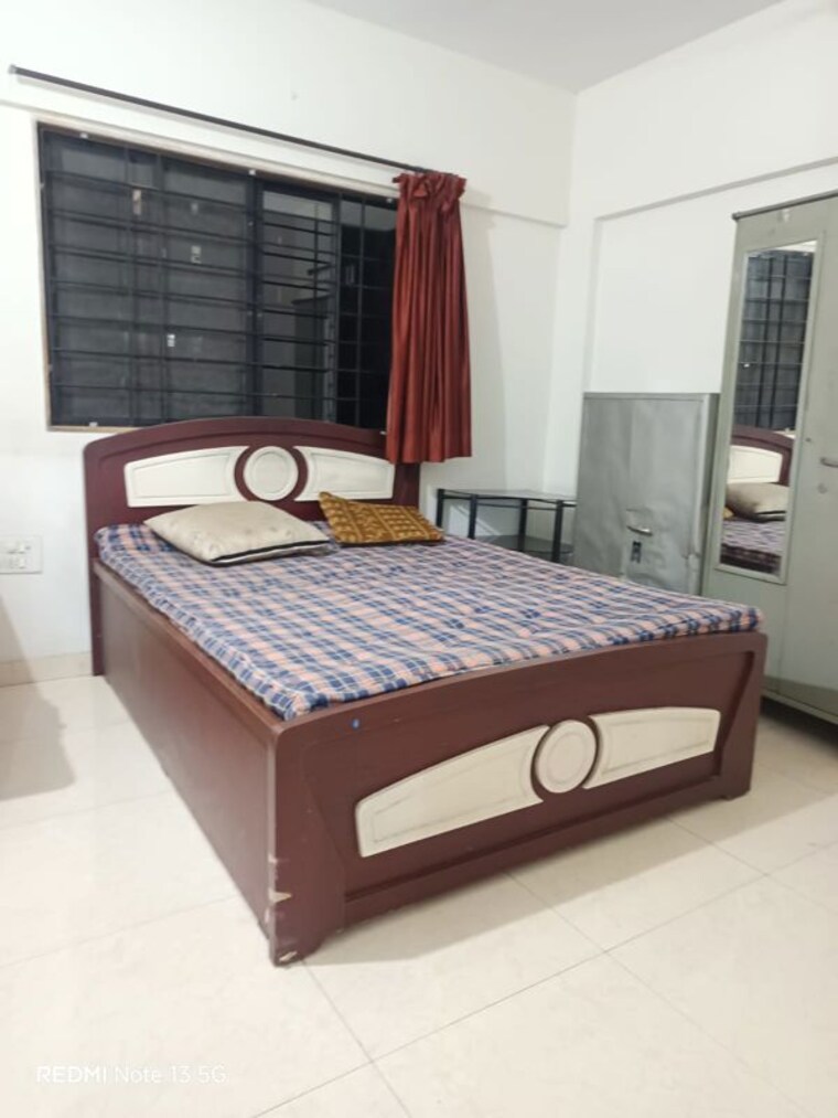 Bedroom, magarpatta-city-cosmos 2 Bedroom 1000 Sq.Ft. Apartment In Magarpatta Road Pune 10302016
