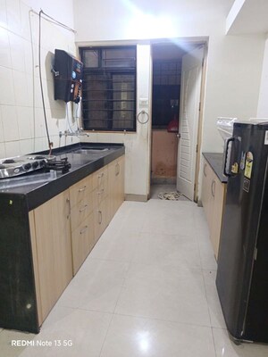 Kitchen in 2 BHK Apartment at Magarpatta City Cosmos, Magarpatta Road – for Rent