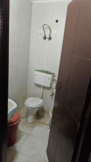 Bathroom in 2 BHK Builder Floor at Chattarpur – for Sale