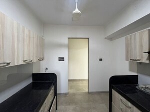 Kitchen in 2 BHK Apartment at Shreeji Harmony, Mulund West – for Rent