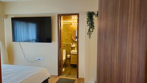 Bedroom in 2 BHK Apartment at Shapoorji Pallonji Astron, Kandivali East – for Rent