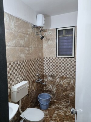 Bathroom in 2 BHK Apartment at Raviraj Ariiana, Kharadi – for Rent