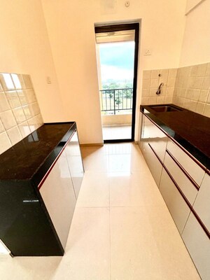 Kitchen in 2 BHK Apartment at Shapoorji Pallonji Joyville Hadapsar Annexe, Hadapsar – for Rent