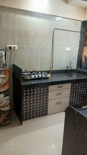 Kitchen in 1 BHK Apartment at Ajmera Emerald, Kalyan West – for Sale