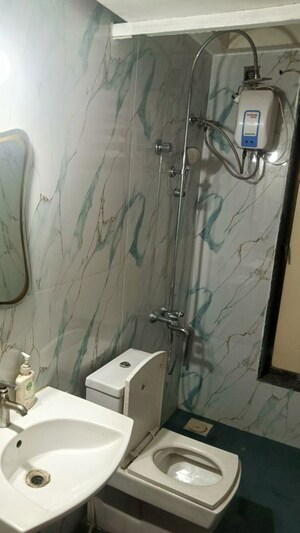Bathroom in 1 BHK Apartment at Ajmera Emerald, Kalyan West – for Sale