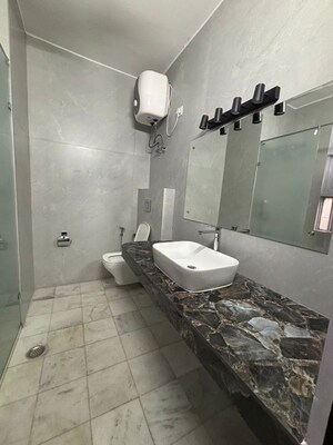 Bathroom in 2.5 BHK Builder Floor at Vasant Vihar – for Rent