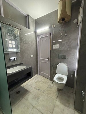 Bathroom in 2.5 BHK Builder Floor at Vasant Vihar – for Rent