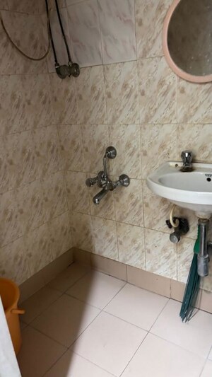 Bathroom in 1 BHK Apartment at Dheeraj Valley, Goregaon East – for Rent