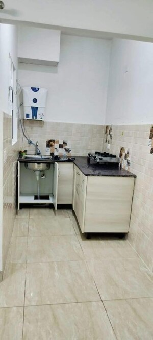 Kitchen in 1 RK Apartment at Gaur City 2 - 14th Avenue, Sector 16c Greater Noida – for Rent
