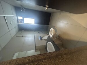 Bathroom in 3 BHK Apartment at Kolte Patil Tuscan Estate, Kharadi – for Rent