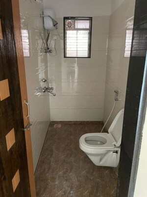 Bathroom in 2 BHK Apartment at Triveni Apartments Tilak Nagar, Tilak Nagar – for Sale