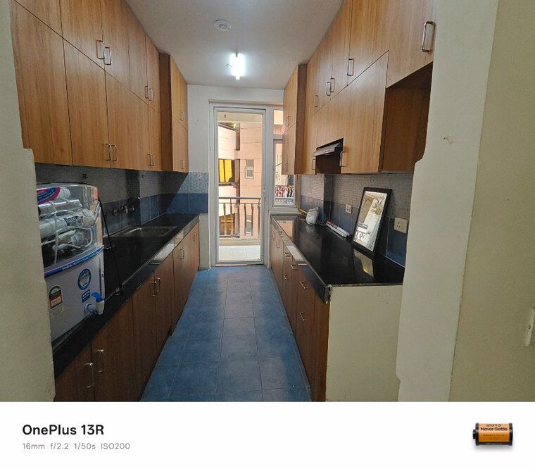 Kitchen, sikka-karmic-greens 2.5 Bedroom 1110 Sq.Ft. Apartment In Sector 78 Noida 10302967