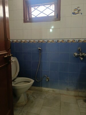 Bathroom in 3 BHK Builder Floor at NIho Scottish Royale Villa, South City 2 – for Rent