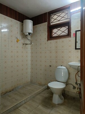 Bathroom in 3 BHK Builder Floor at NIho Scottish Royale Villa, South City 2 – for Rent