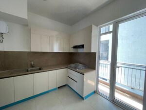 Kitchen in 3 BHK Apartment at Godrej Meridien, Sector 106 – for Rent