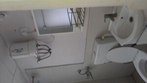 Bathroom in 3 BHK Apartment at Conscient Habitat 78, Sector 78 – for Rent