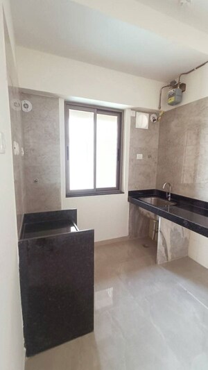 Kitchen in 2 BHK Apartment at Sheth Auris Bliss, Malad West – for Rent