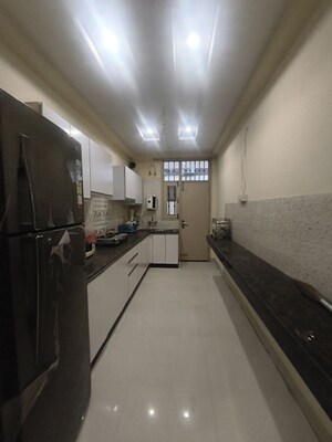 Kitchen in 3.5 BHK Apartment at Mona Greens, Ghazipur – for Sale