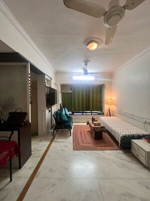Living Room in 1 BHK Apartment at Andheri West – for Rent