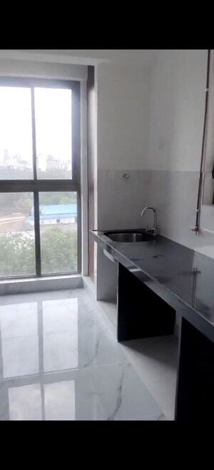 Kitchen in 2 BHK Apartment at Raymond Ten X Habitat, Pokhran Road No Two – for Sale