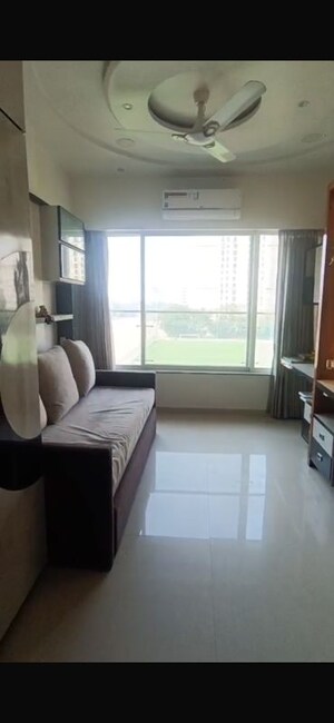 Living Room in 2 BHK Apartment at Jayesh Shiv Parvati CHS, Kandivali West – for Sale