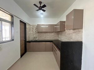 Kitchen in 2 BHK Apartment at Kamdhenu 7th Heaven, Dhanori – for Rent