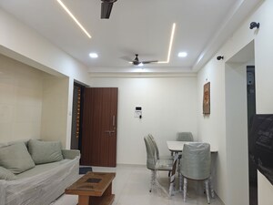 Living Room in 1 BHK Apartment at Raunak Bliss, Ghodbunder Road – for Rent