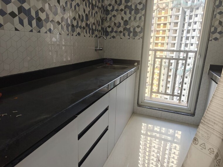 Kitchen, raunak-bliss 1 Bedroom 500 Sq.Ft. Apartment In Ghodbunder Road Thane 10303391