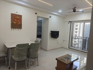 Living Room in 1 BHK Apartment at Raunak Bliss, Ghodbunder Road – for Rent