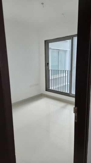 Room in 2 BHK Apartment at Sunteck City Avenue 4, Goregaon West – for Sale