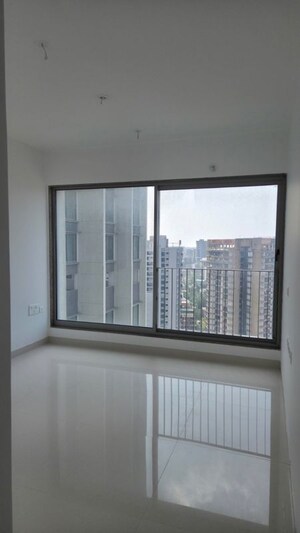 Room in 2 BHK Apartment at Sunteck City Avenue 4, Goregaon West – for Sale