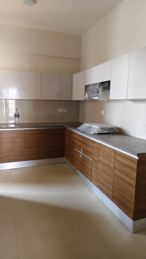 Kitchen in 3.5 BHK Apartment at Kalpataru Vista, Sector 128 – for Rent