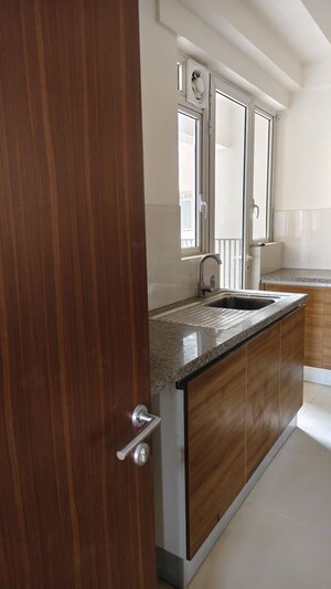 Kitchen in 3.5 BHK Apartment at Kalpataru Vista, Sector 128 – for Rent