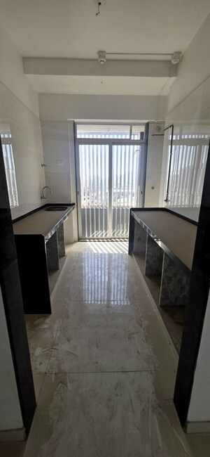 Kitchen in 2 BHK Apartment at Shreeji Atlantis, Malad West – for Rent