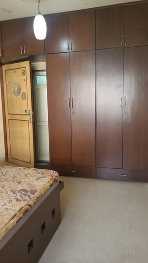 Bedroom in 3 BHK Apartment at K Raheja Palm Court, Malad West – for Rent