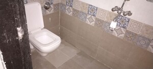 Bathroom in 3 BHK Apartment at Kanchan Nalanda CHS, Malad West – for Rent