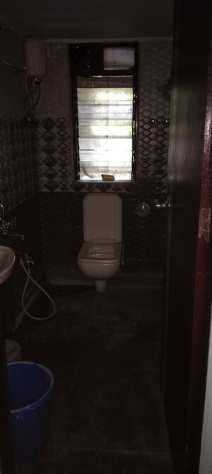 Bathroom in 3 BHK Apartment at Kanchan Nalanda CHS, Malad West – for Rent