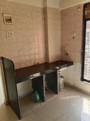 Kitchen in 1 BHK Apartment at Maad Yashwant Pride-Kini Complex, Naigaon East – for Rent