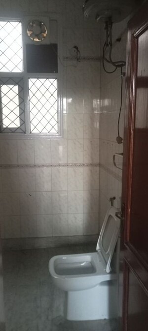 Bathroom in 4 BHK Builder Floor at Gulmohar Park – for Rent