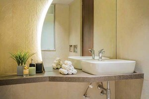 Bathroom in 4 BHK Apartment at Kumar Prism, Hadapsar – for Sale