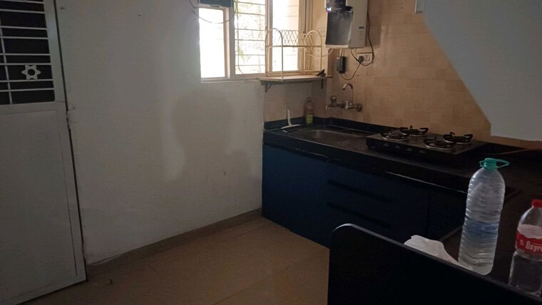 Kitchen, belvalkar-solacia-phase-i 3 Bedroom 1050 Sq.Ft. Apartment In Wagholi Pune 10303624