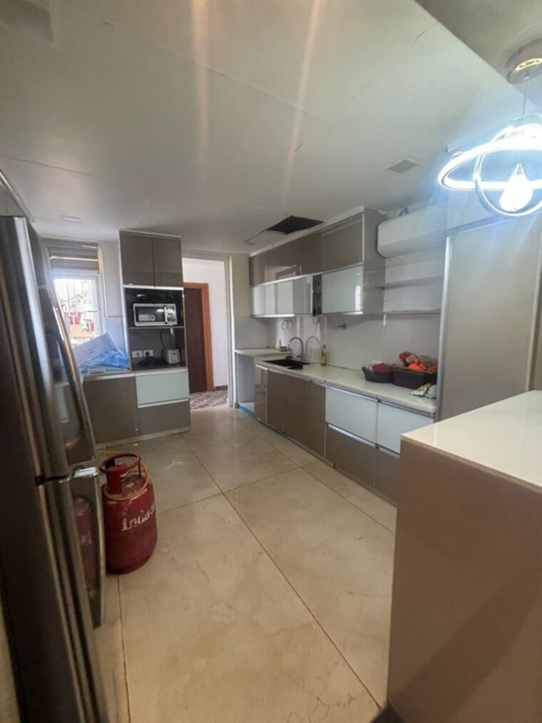 Kitchen, mi-rustle-court 3.5 Bedroom 2200 Sq.Ft. Apartment In Gomti Nagar Lucknow 10303791