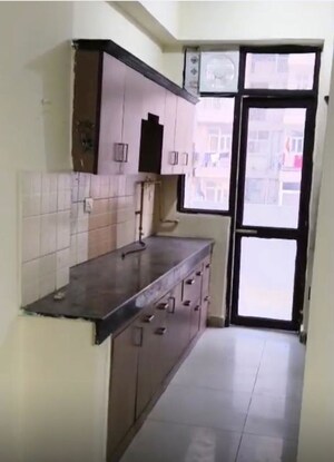 Kitchen in 4 BHK Apartment at Ajnara Grace, Raj Nagar Extension – for Sale