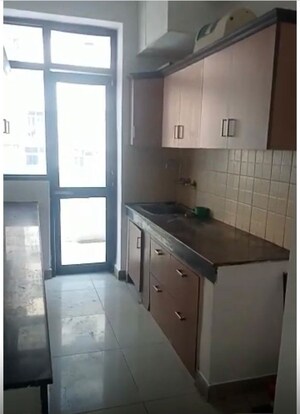 Kitchen in 4 BHK Apartment at Ajnara Grace, Raj Nagar Extension – for Sale