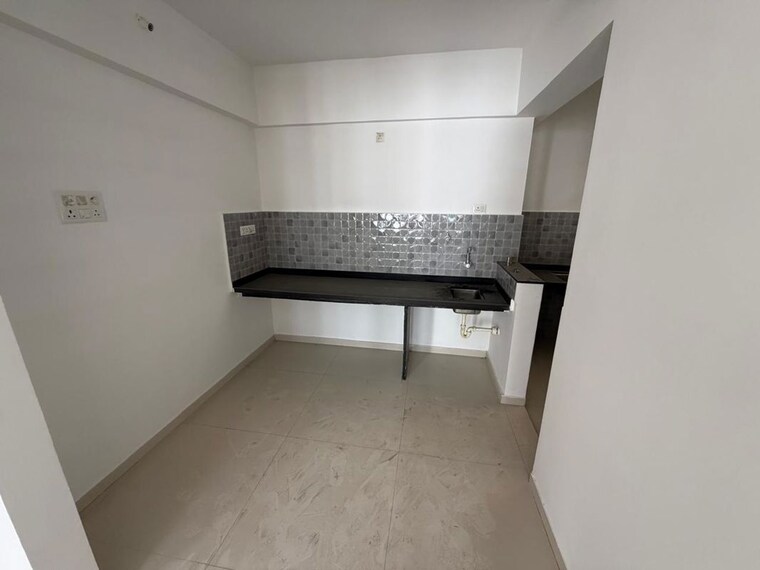 Kitchen, krisala-41-elite 2 Bedroom 677 Sq.Ft. Apartment In Tathawade Pune 10303973