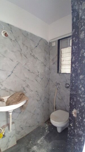 Bathroom in 1 BHK Apartment at SS Rishabh Villa, Malad East – for Rent