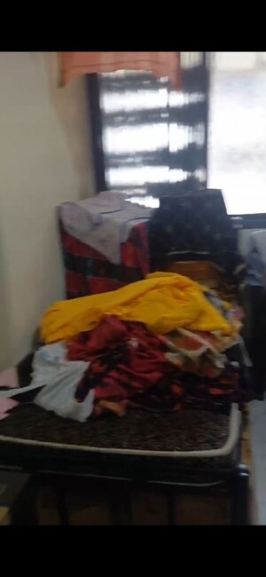 Bedroom in 2 BHK Apartment at Milap CHS, Andheri West – for Rent