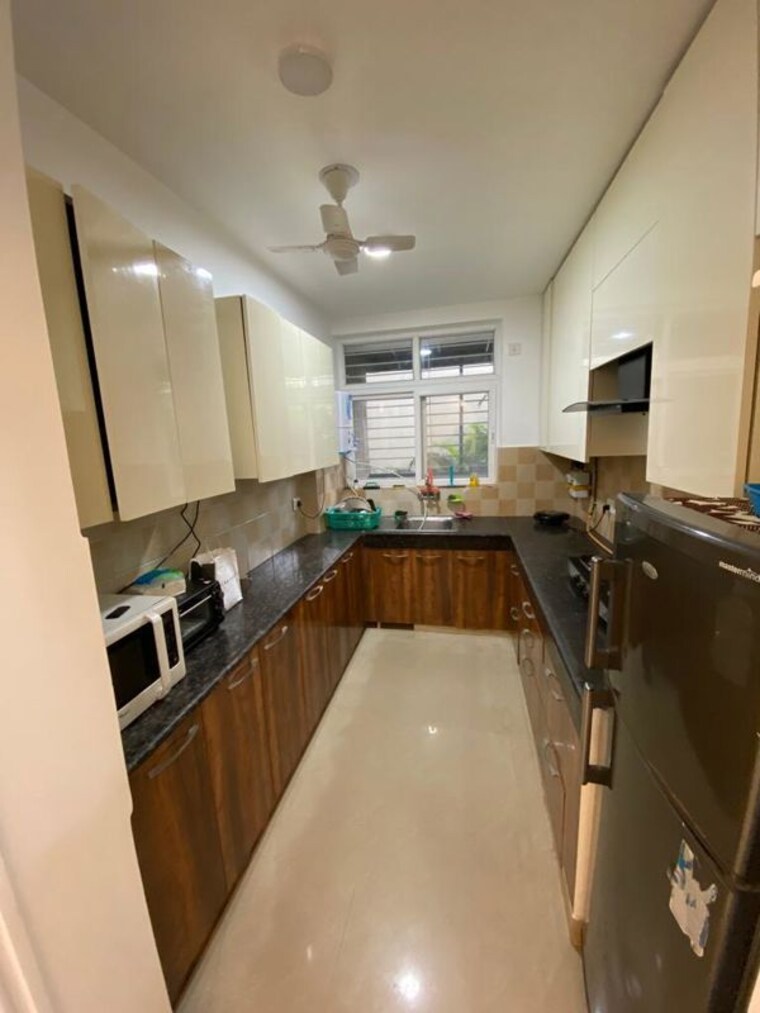 Kitchen, amrapali-heartbeat-city 3 Bedroom 1575 Sq.Ft. Apartment In Sector 107 Noida 10304015